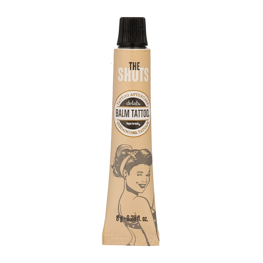 Close-up of a single Balm Tattoo Shot Vegan Formula tube, 8g size, with retro-inspired packaging for premium tattoo aftercare.