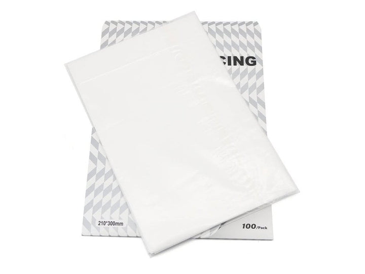 Semi-transparent OZER X tattoo stencil paper roll, 216 mm wide